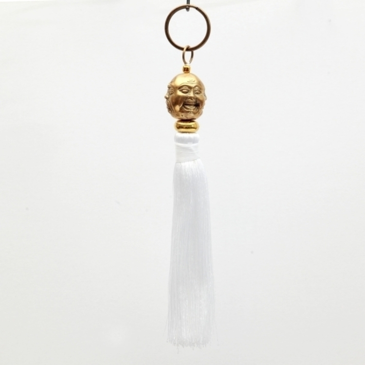 The 4-Faces Keychain - White